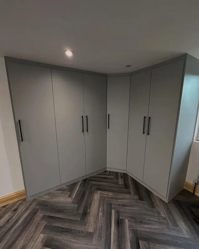 Grey corner wardrobes closed
